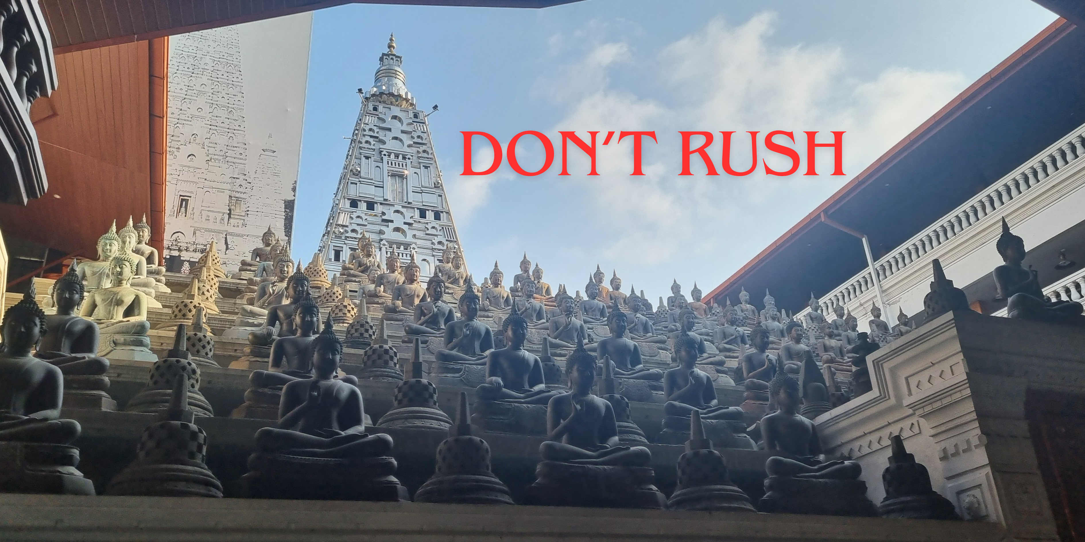 Buddhas in a temple in Colombo, Sri Lanka, reminicent of the lingas in the Koti Lingeshwara Temple.