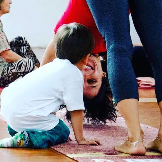 The perfect capture of yoga and motherhood.